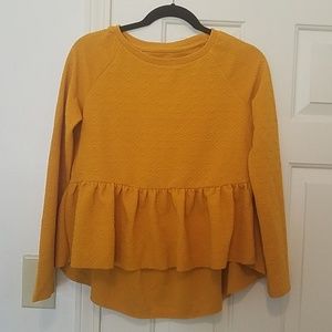 Long sleeved mustard top.